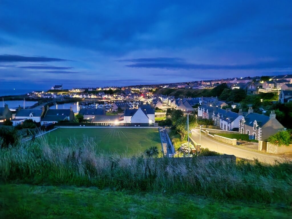 Findochty harbour and village in late afternoon light.
