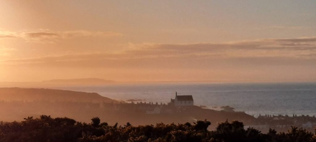 Church on the hill at sunset.