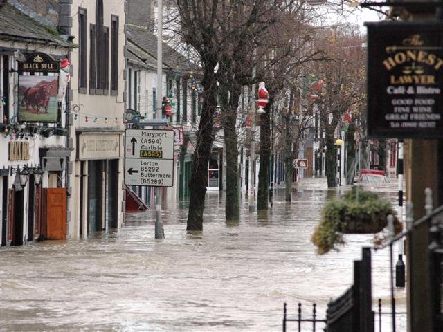 A flooded road showing the effects of severe flooding.